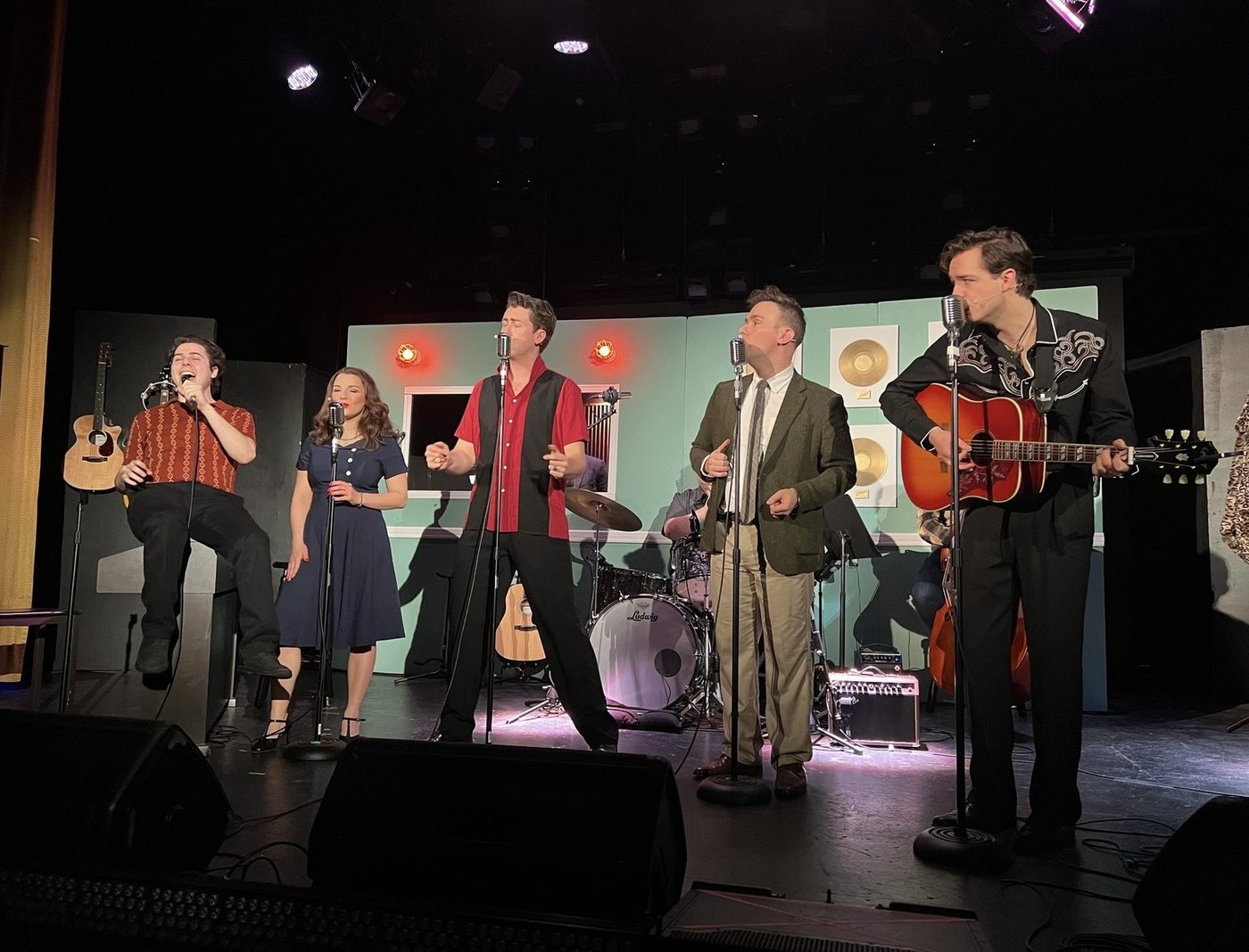 Taryn Wichenko performing with a band